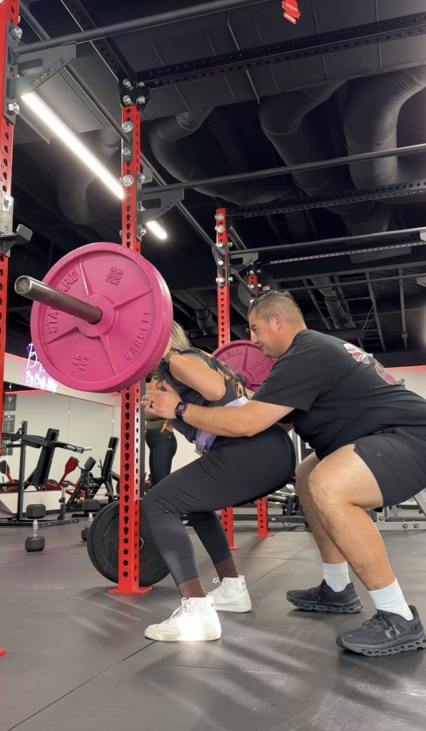 Coach Ree, founder of REEWORK ME, in the Monterey Park gym